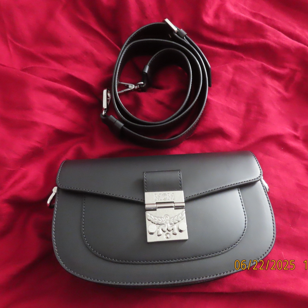 MCM Black Crossbody Bag with Sleek Silver Clasp